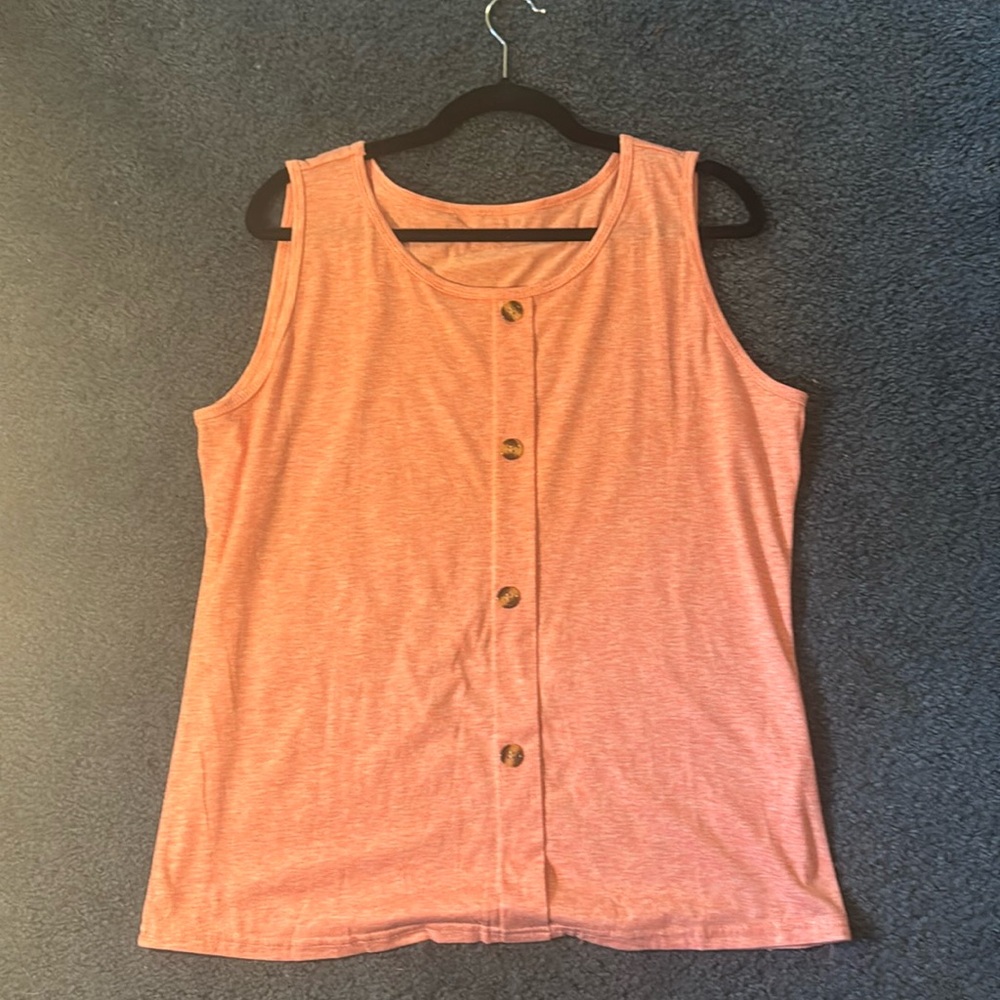 Pink woman’s button up tank top